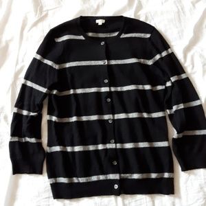 A black and gray striped cardigan sweater